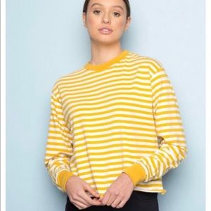 Brandy Melville
soft yellow striped top.